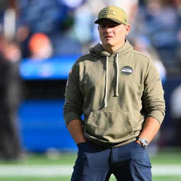 Nov 9, 2025; Seattle, Washington, USA; Seattle Seahawks head coach Mike Macdonald looks on before the game against the Arizona Cardinals  at Lumen Field. Mandatory Credit: Steven Bisig-Imagn Images