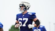 Jul 25, 2024; East Rutherford, NY, USA; New York Giants center Jimmy Morrissey (67) jogs to the sideline during training camp at Quest Diagnostics Training Center. 