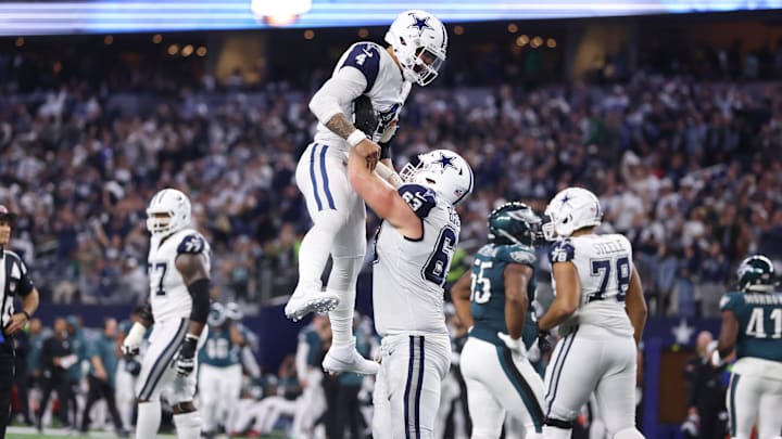 Dallas Cowboys quarterback Dak Prescott celebrates a touchdown Dallas Cowboys quarterback Dak Prescott celebrates a touchdown