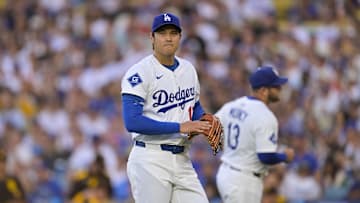 Jun 16, 2025; Los Angeles, California, USA; Los Angeles Dodgers designated hitter Shohei Ohtani (17) looks on after the top of the first inning against the San Diego Padres at Dodger Stadium. Mandatory Credit: Jayne Kamin-Oncea-Imagn Images