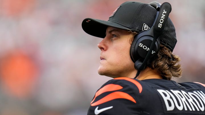 Cincinnati Bengals quarterback Joe Burrow (9) looks on from the sideline after leaving the game in the fourth quarter of the NFL Week 17 game between the Cincinnati Bengals and the Arizona Cardinals at Paycor Stadium in Downtown Cincinnati on Sunday, Dec. 28, 2025. The Bengals won 37-14.