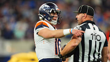 NFL Umpire Tab Slaughter speaking to Broncos QB Bo Nix during December 19, 2024 game Denver Broncos v Los Angeles Chargers.