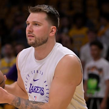 Apr 19, 2025; Los Angeles, California, USA;  Los Angeles Lakers guard Luka Doncic (77) warms up prior to the game against the Minnesota Timberwolves at Crypto.com Arena. Mandatory Credit: Jayne Kamin-Oncea-Imagn Images