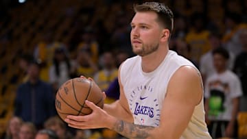 Apr 19, 2025; Los Angeles, California, USA;  Los Angeles Lakers guard Luka Doncic (77) warms up prior to the game against the Minnesota Timberwolves at Crypto.com Arena. Mandatory Credit: Jayne Kamin-Oncea-Imagn Images