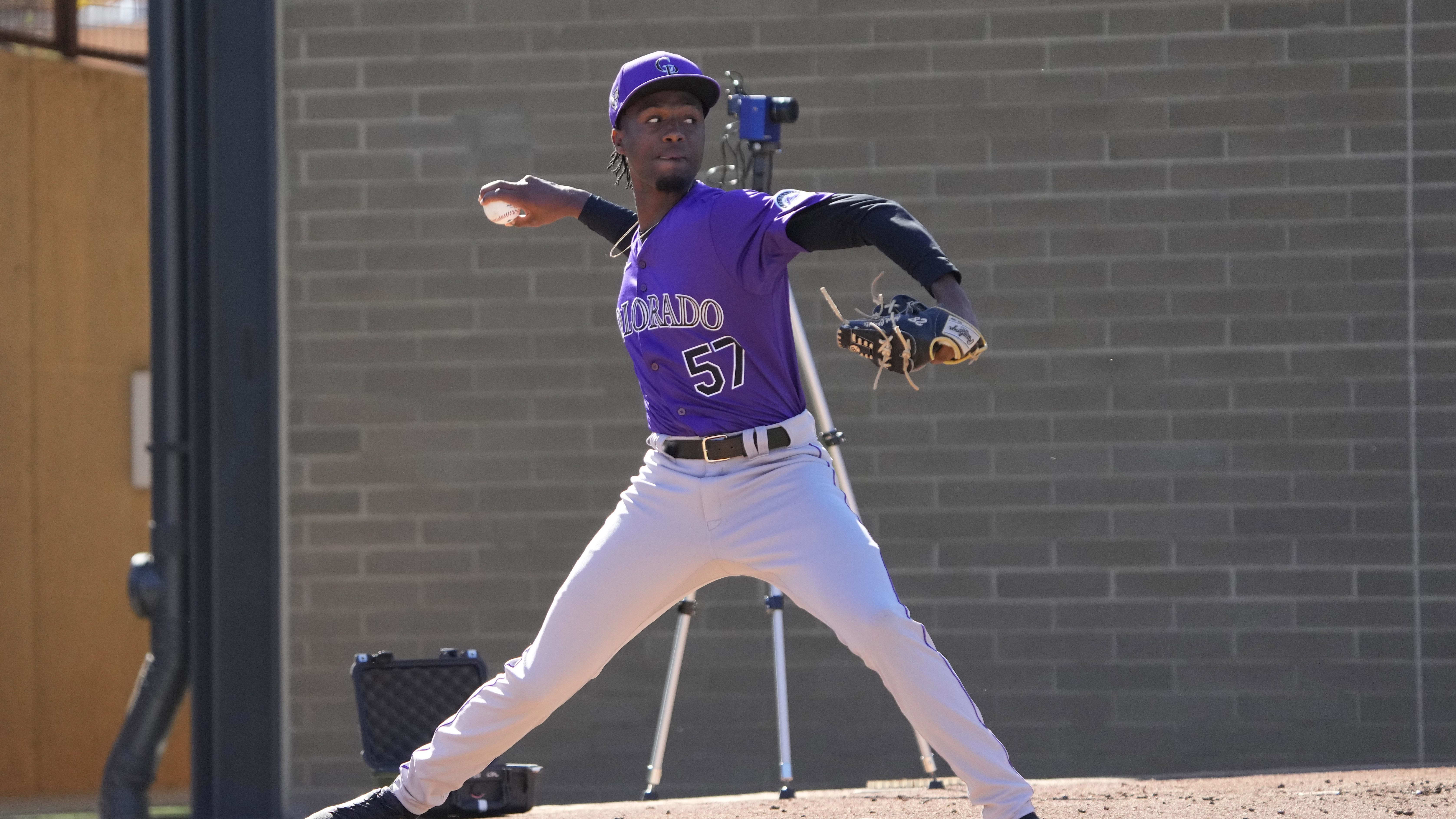 Feb 19, 2024; Scottsdale, AZ, USA; Colorado Rockies relief pitcher Angel Chivilli (57) throws in the bullpen.