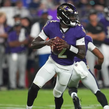 Aug 12, 2023; Baltimore, Maryland, USA; Baltimore Ravens quarterback Tyler Huntley (2) rolls out to pass in the third quarter against the Philadelphia Eagles at M&T Bank Stadium. Mandatory Credit: Mitch Stringer-USA TODAY Sports