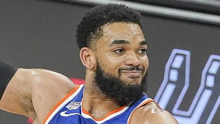 Jun 5, 2026; San Antonio, Texas, USA; New York Knicks center Karl-Anthony Towns (32) looks to move the ball past San Antonio Spurs forward Carter Bryant (11) in the first quarter during game two of the 2026 NBA Finals at Frost Bank Center. Mandatory Credit: Daniel Dunn-Imagn Images