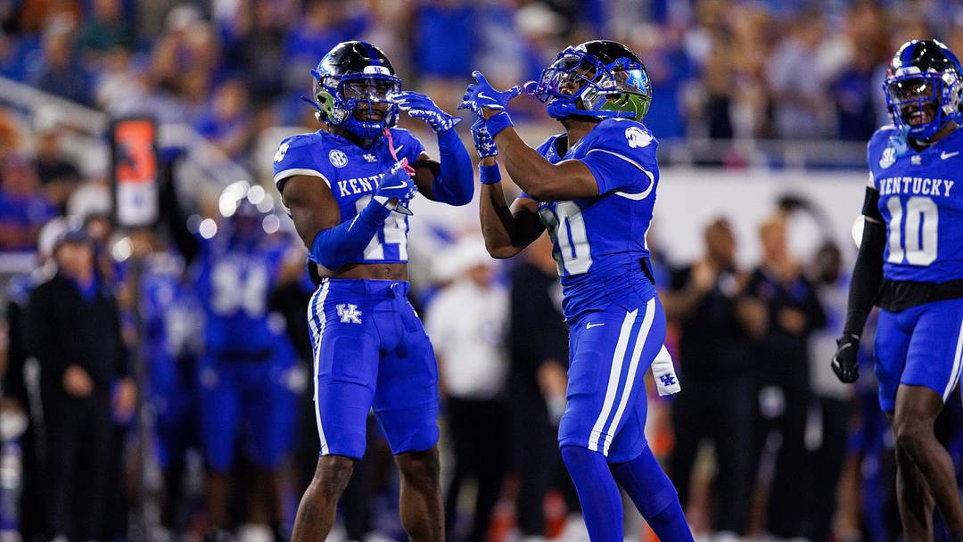 Oct 18, 2025; Lexington, Kentucky, USA; Kentucky Wildcats defensive back Terhyon Nichols (20) and defensive back Ty Bryant (14) react after a tackle during the second quarter against the Texas Longhorns at Kroger Field. Oct 18, 2025; Lexington, Kentucky, USA; Kentucky Wildcats defensive back Terhyon Nichols (20) and defensive back Ty Bryant (14) react after a tackle during the second quarter against the Texas Longhorns at Kroger Field.