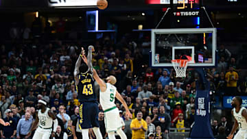 Oct 30, 2024; Indianapolis, Indiana, USA; Indiana Pacers forward Pascal Siakam (43) shoots a three pointer late in overtime to take the lead against the Boston Celtics at Gainbridge Fieldhouse. Mandatory Credit: Marc Lebryk-Imagn Images