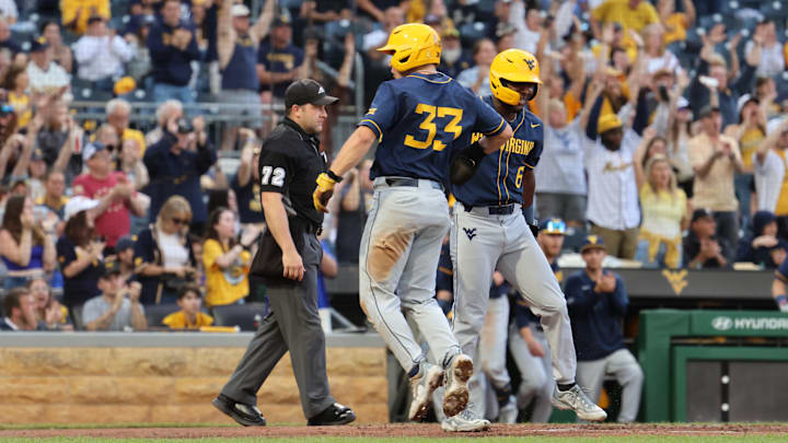 Logan Sauve celebrates with Skylar King against Pitt Logan Sauve celebrates with Skylar King against Pitt