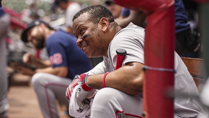 Jun 1, 2025; Cumberland, Georgia, USA; Boston Red Sox designated hitter Rafael Devers (11) watches a promotion on the scoreboard during the game against the Atlanta Braves at Truist Park. Mandatory Credit: Dale Zanine-Imagn Images