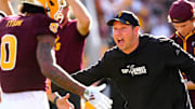 Arizona State head coach Kenny Dillingham celebrates with wide receiver Jordyn Tyson (0) after a touchdown drive against BYU.