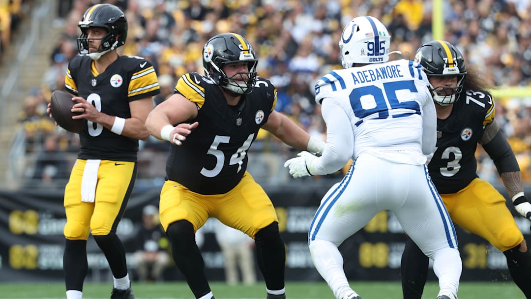 Nov 2, 2025; Pittsburgh, Pennsylvania, USA;  Pittsburgh Steelers center Zach Frazier (54) pass blocks at the line of scrimmage against Indianapolis Colts defensive tackle Adetomiwa Adebawore (95) during the second quarter at Acrisure Stadium. Mandatory Credit: Charles LeClaire-Imagn Images