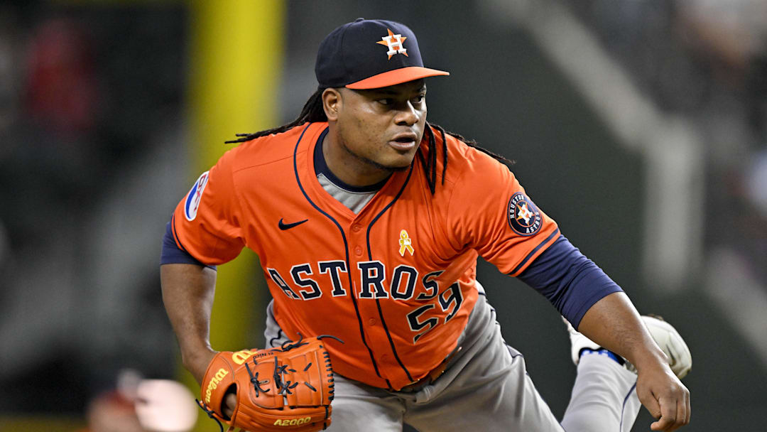 Sep 7, 2025; Arlington, Texas, USA; Houston Astros starting pitcher Framber Valdez (59) pitches against the Texas Rangers during the first inning at Globe Life Field. Mandatory Credit: Jerome Miron-Imagn Images