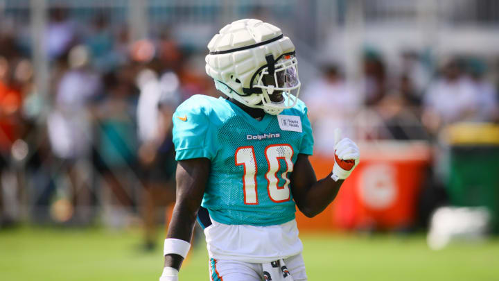 Miami Dolphins wide receiver Tyreek Hill (10) reacts during a joint practice with the Atlanta Falcons at Baptist Health Training Complex.