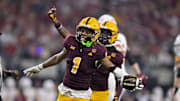Dec 7, 2024; Arlington, TX, USA; Arizona State Sun Devils defensive back Keith Abney II (1) and defensive back Shamari Simmons (7) celebrate during the game between the Iowa State Cyclones and the Arizona State Sun Devils at AT&T Stadium. Mandatory Credit: Jerome Miron-Imagn Images