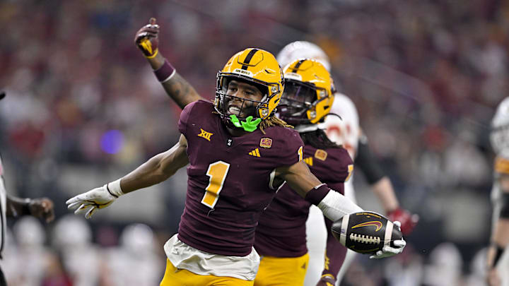 Dec 7, 2024; Arlington, TX, USA; Arizona State Sun Devils defensive back Keith Abney II (1) and defensive back Shamari Simmons (7) celebrate during the game between the Iowa State Cyclones and the Arizona State Sun Devils at AT&T Stadium. Mandatory Credit: Jerome Miron-Imagn Images Dec 7, 2024; Arlington, TX, USA; Arizona State Sun Devils defensive back Keith Abney II (1) and defensive back Shamari Simmons (7) celebrate during the game between the Iowa State Cyclones and the Arizona State Sun Devils at AT&T Stadium. Mandatory Credit: Jerome Miron-Imagn Images