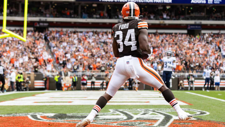 Sep 24, 2023; Cleveland, Ohio, USA; Cleveland Browns running back Jerome Ford (34) makes a catch in the end zone for a touchdown during the second quarter against the Tennessee Titans at Cleveland Browns Stadium. Mandatory Credit: Scott Galvin-USA TODAY Sports