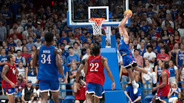 Kansas men's basketball's Jayden Dawson (1) dunks the ball during Late Night in the Phog, Friday, Oct. 17, 2025 at Allen Fieldhouse .
