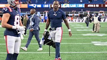 Nov 17, 2024; Foxborough, Massachusetts, USA;  New England Patriots quarterback Joe Milton III (19) leaves the field after game against the Los Angeles Rams at Gillette Stadium. Mandatory Credit: Eric Canha-Imagn Images