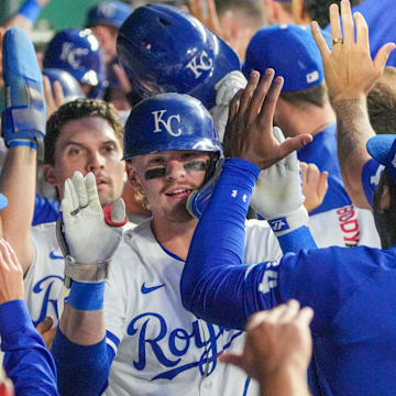 Sep 16, 2024; Kansas City, Missouri, USA; Kansas City Royals shortstop Bobby Witt Jr. (7) celebrates in the dugout after hitting a grand slam against the Detroit Tigers in the third inning at Kauffman Stadium. Mandatory Credit: Denny Medley-Imagn Images