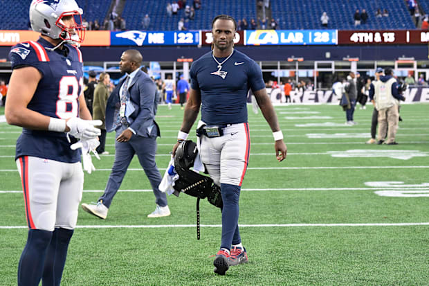 New England Patriots quarterback Joe Milton III leaves the field after a game against the Los Angeles Rams.