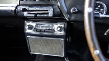 Radio In A 1961 Aston Martin Db4 Gt Swb Lightweight. Creator: Unknown.