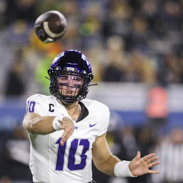 Oct 25, 2025; Morgantown, West Virginia, USA; Texas Christian University Horned Frogs quarterback Josh Hoover (10) throws a pass during the third quarter against the West Virginia Mountaineers at Milan Puskar Stadium. Mandatory Credit: Ben Queen-Imagn Images