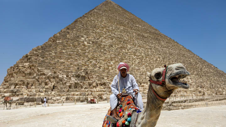 Tourists Visit Pyramids At Giza Tourists Visit Pyramids At Giza