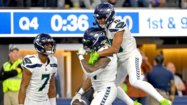 Dec 4, 2022; Inglewood, California, USA;  Seattle Seahawks wide receiver Tyler Lockett (16) celebrates with quarterback Geno Smith (7) and wide receiver DK Metcalf (14) after a touchdown in the fourth quarter against the Los Angeles Rams at SoFi Stadium. Mandatory Credit: Jayne Kamin-Oncea-USA TODAY Sports