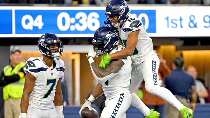 Dec 4, 2022; Inglewood, California, USA;  Seattle Seahawks wide receiver Tyler Lockett (16) celebrates with quarterback Geno Smith (7) and wide receiver DK Metcalf (14) after a touchdown in the fourth quarter against the Los Angeles Rams at SoFi Stadium. Mandatory Credit: Jayne Kamin-Oncea-USA TODAY Sports