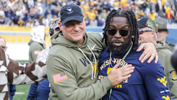 Nov 8, 2025; Morgantown, West Virginia, USA; West Virginia Mountaineers head coach Rich Rodriguez celebrates after defeating the Colorado Buffaloes at Milan Puskar Stadium. Mandatory Credit: Ben Queen-Imagn Images