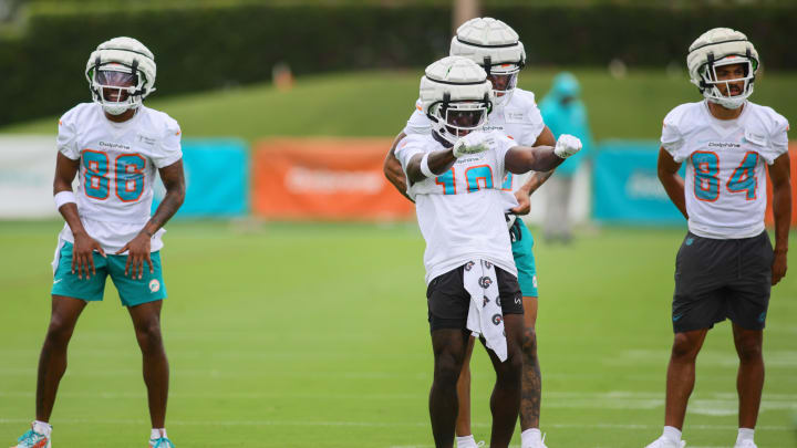 Jul 24, 2024; Miami Gardens, FL, USA; Miami Dolphins wide receiver Tyreek Hill (10) dances during training camp at Baptist Health Training Complex.