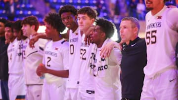 Dec 9, 2025; Morgantown, West Virginia, USA; West Virginia Mountaineers players celebrate after defeating the Little Rock Trojans at Hope Coliseum. Mandatory Credit: Ben Queen-Imagn Images