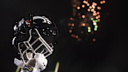 Cincinnati Bearcats player lifts his helmet after the Birmingham Bowl between Cincinnati Bearcats and Boston College Eagles on Thursday, Jan. 2, 2020, at Legion Field in Birmingham, Ala. Cincinnati Bearcats wont 38-6.

Birmingham Bowl