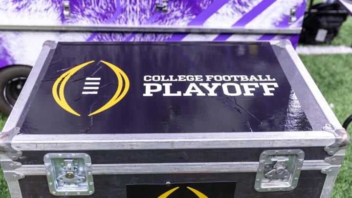 Jan 1, 2024; New Orleans, LA, USA; A general view of the College Football Playoff logo on a case on the Washington Huskies sideline before the 2024 Sugar Bowl college football playoff semifinal game between the Texas Longhorns and the Washington Huskies at Caesars Superdome. Mandatory Credit: Stephen Lew-USA TODAY Sports