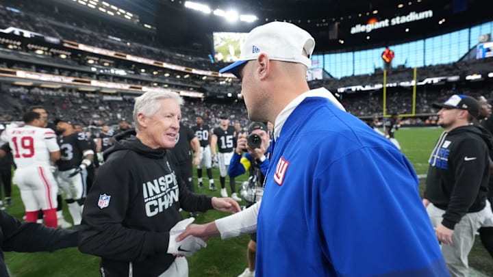 Dec 28, 2025; Paradise, Nevada, USA; New York Giants head coach Mike Kafka shakes hands with Las Vegas Raiders head coach Pete Carroll after the game at Allegiant Stadium. Mandatory Credit: Kirby Lee-Imagn Images