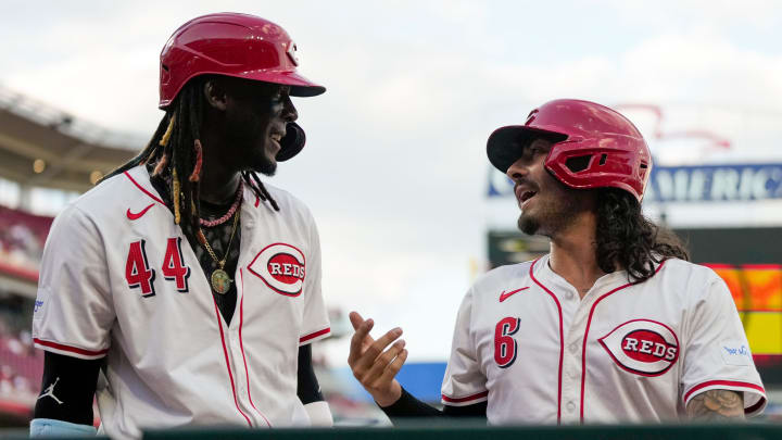Cincinnati Reds shortstop Elly De La Cruz (44) and second base Jonathan India (6) chat as they return to the dugout after scoring on a Spencer Steer double in the fourth inning of the MLB National League game between the Cincinnati Reds and the Pittsburgh Pirates at Great American Ball Park on Monday, June 24, 2024.