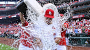 Jul 31, 2024; St. Louis, Missouri, USA;  St. Louis Cardinals starting pitcher Michael McGreevy (36) is doused with water by pitcher Miles Mikolas (left) and pitcher Kyle Gibson (right) after winning his first MLB game in his Major League Debut against the Texas Rangers at Busch Stadium. Mandatory Credit: Jeff Curry-Imagn Images