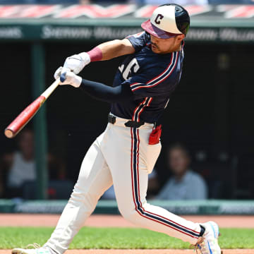 Jun 20, 2024; Cleveland, Ohio, USA; Cleveland Guardians left fielder Steven Kwan (38) hits a double during the first inning against the Seattle Mariners at Progressive Field. Mandatory Credit: Ken Blaze-USA TODAY Sports