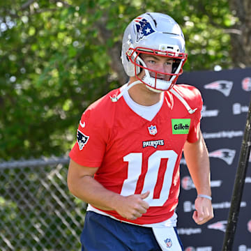 Jul 23, 2025; Foxborough, MA, USA; New England Patriots quarterback Drake Maye (10) jogs to the practice field for training camp at Gillette Stadium. Mandatory Credit: Eric Canha-Imagn Images
