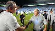 Sep 1, 2025; Chapel Hill, North Carolina, USA; North Carolina Tar Heels head coach Bill Belichick with TCU Horned Frogs head coach Sonny Dykes after the game at Kenan Stadium. Mandatory Credit: Bob Donnan-Imagn Images