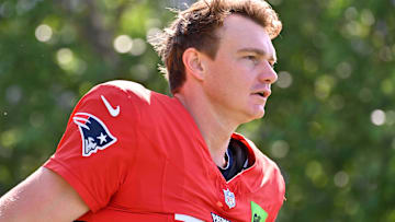 New England Patriots quarterback Ben Wooldridge (17) heads to the practice fields for training camp at Gillette Stadium.