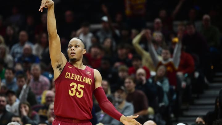 Dec 16, 2023; Cleveland, Ohio, USA; Cleveland Cavaliers forward Isaac Okoro (35) hits a three point basket during the second half against the Atlanta Hawks at Rocket Mortgage FieldHouse. Mandatory Credit: Ken Blaze-USA TODAY Sports