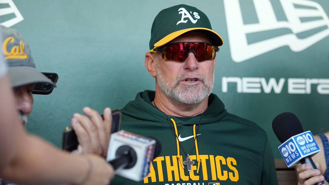 May 16, 2026; West Sacramento, California, USA; Athletics manager Mark Kotsay (7) talks to media members before the game against the San Francisco Giants at Sutter Health Park. Mandatory Credit: Darren Yamashita-Imagn Images