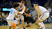 Nov 18, 2025; Los Angeles, California, USA;  Sacramento State Hornets guard Prophet Johnson (16), UCLA Bruins guard Skyy Clark (55), forward Tyler Bilodeau (34) and guard Jamar Brown (4) scramble for a loose ball during the first half at Pauley Pavilion presented by Wescom Financial. Mandatory Credit: Jayne Kamin-Oncea-Imagn Images