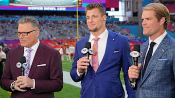 Feb 12, 2023; Glendale, Arizona, US; (Left to right) FOX Sports personalities Howie Long, Rob Gronkowski, and Greg Olsen before Super Bowl LVII at State Farm Stadium.