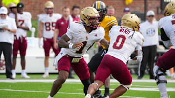 Sep 14, 2024; Columbia, Missouri, USA; Boston College Eagles quarterback Thomas Castellanos (1) hands off to running back Treshaun Ward (0) against the Missouri Tigers during the second half at Faurot Field at Memorial Stadium. Mandatory Credit: Denny Medley-Imagn Images
