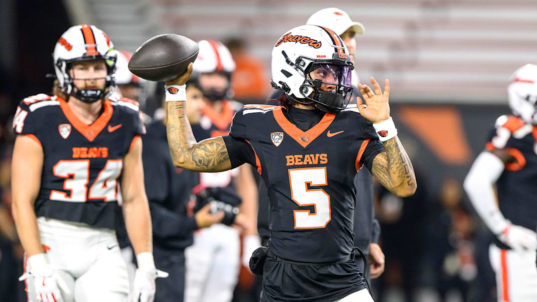Oct 18, 2025; Corvallis, Oregon, USA; Oregon State Beavers quarterback Gabarri Johnson (5) warms ip before the game against the Lafayette Leopards at Reser Stadium. Mandatory Credit: Craig Strobeck-Imagn Images