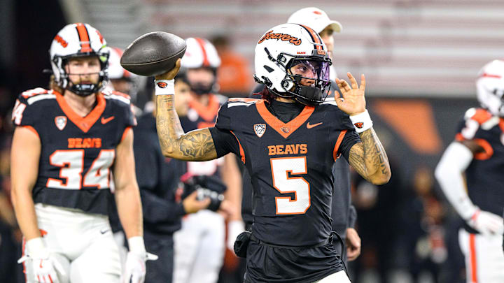 Oct 18, 2025; Corvallis, Oregon, USA; Oregon State Beavers quarterback Gabarri Johnson (5) warms ip before the game against the Lafayette Leopards at Reser Stadium. Mandatory Credit: Craig Strobeck-Imagn Images
